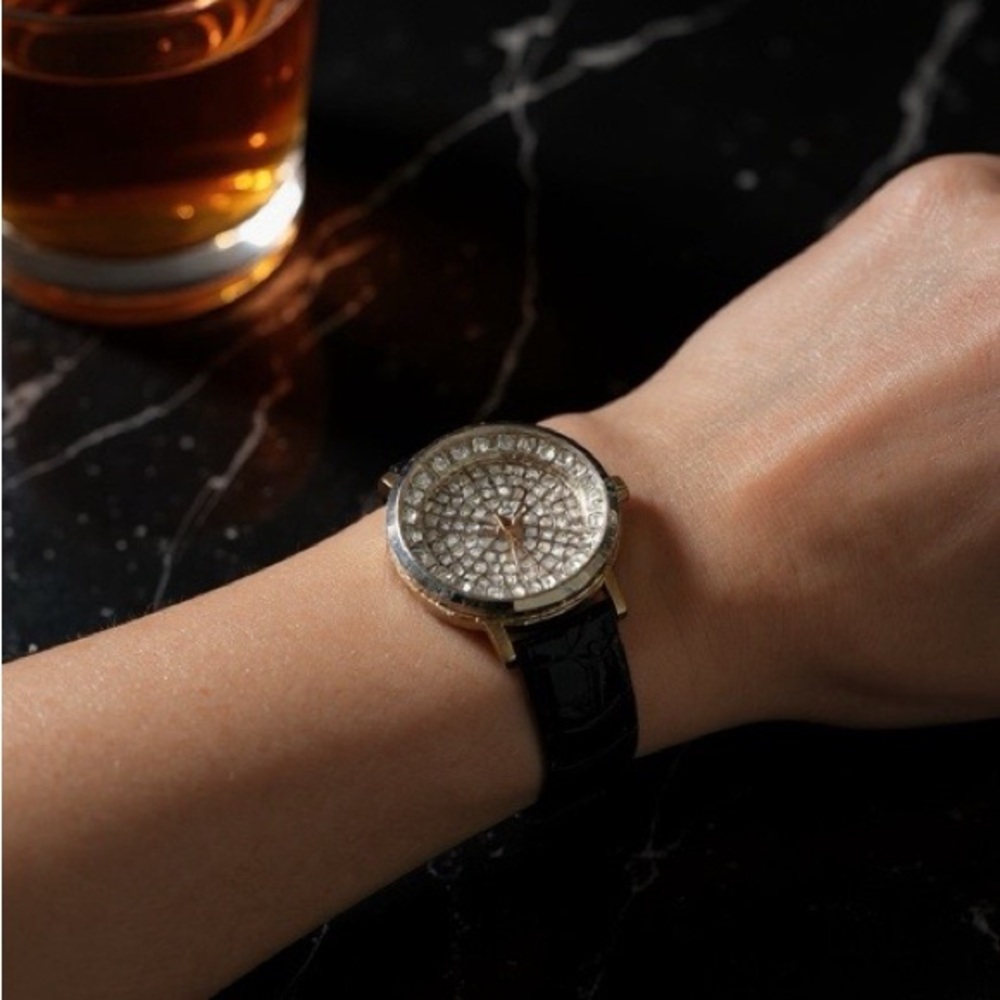 Elegant Gold and Black Leather Women's Watch
